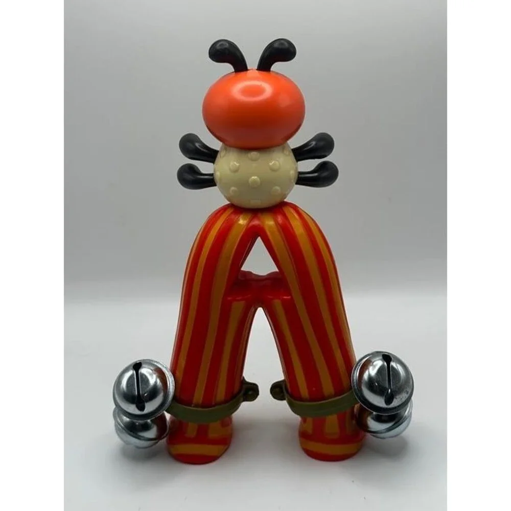 Cheerful Ladybug Toy with Jingle Bells and Striped Legs